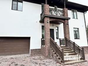 Коттедж 524м², 3-этажный, участок 12 сот.