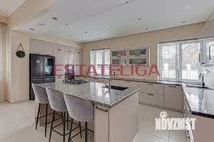 Коттедж 1500м², 3-этажный, участок 35 сот.  