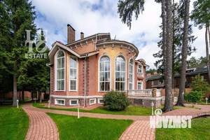 Коттедж 1177м², 4-этажный, участок 25 сот.  