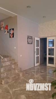 Коттедж 520м², 3-этажный, участок 14 сот.  