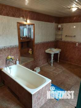 Коттедж 670м², 2-этажный, участок 12 сот.  