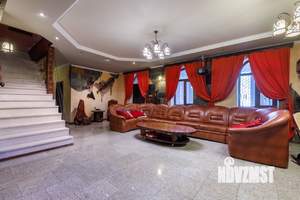 Коттедж 350м², 4-этажный, участок 20 сот.  