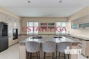 Коттедж 1500м², 3-этажный, участок 35 сот.  